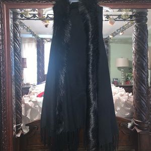 Black fur vest with fringe